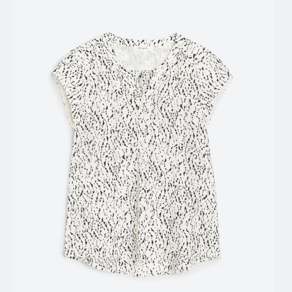 Elegant Black and White Blouse with Chic Design